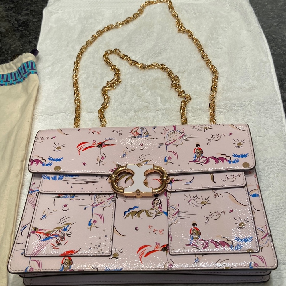 Tory Burch Ladies Light Lavender Medium Size Purse with 2 Pockets in front.